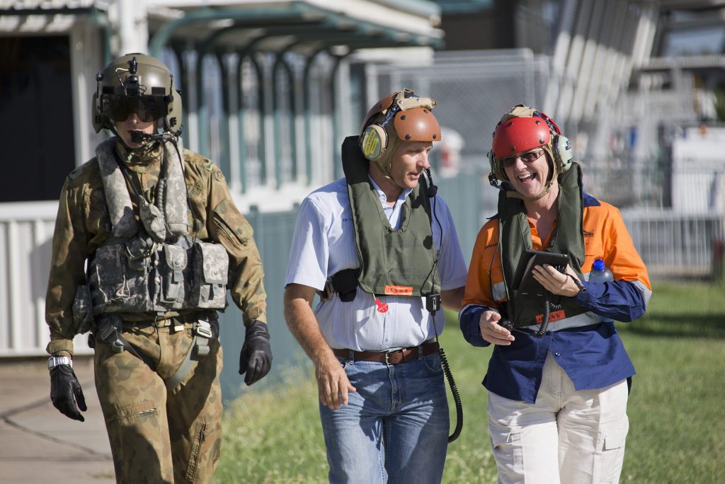 Australian Army Major Andrew Lean (left) from the 5th Aviation Regiment escorts Rockhampton Deputy Mayor Tony Williams (centre) and Mayor Margaret Strelow (right) to an MRH-90 Taipan helicopter before an aerial inspection of the Byfield region. *** Local Caption *** Defence has deployed two MRH-90 Taipan helicopters to Rockhampton to provide aerial inspection support to the region following Cyclone Marcia. The helicopters were dispatched on 24th February 2015 to complement the Emergency Support Force (ESF). On 25th February 2015, the ESF conducted an aerial inspection of the Byfield region with Rockhampton Mayor Margaret Strelow and Deputy Mayor Tony Williams. Australian Army Major Andrew Lean (left) from the 5th Aviation Regiment escorts Rockhampton Deputy Mayor Tony Williams (centre) and Mayor Margaret Strelow (right) to an MRH-90 Taipan helicopter before an aerial inspection of the Byfield region. *** Local Caption *** Defence has deployed two MRH-90 Taipan helicopters to Rockhampton to provide aerial inspection support to the region following Cyclone Marcia. The helicopters were dispatched on 24th February 2015 to complement the Emergency Support Force (ESF). On 25th February 2015, the ESF conducted an aerial inspection of the Byfield region with Rockhampton Mayor Margaret Strelow and Deputy Mayor Tony Williams.