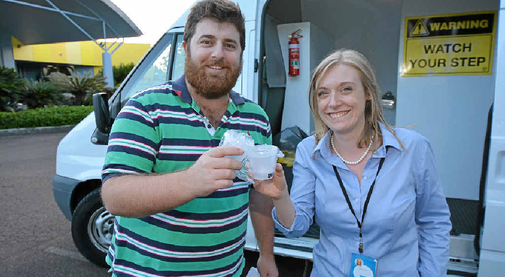 CHEERS: Sunshine Coast Daily editor Jenna Cairney with journalist Scott Sawyer raise a cup to what they’re confident will be a clear drug test. CHEERS: Sunshine Coast Daily editor Jenna Cairney with journalist Scott Sawyer raise a cup to what they’re confident will be a clear drug test.