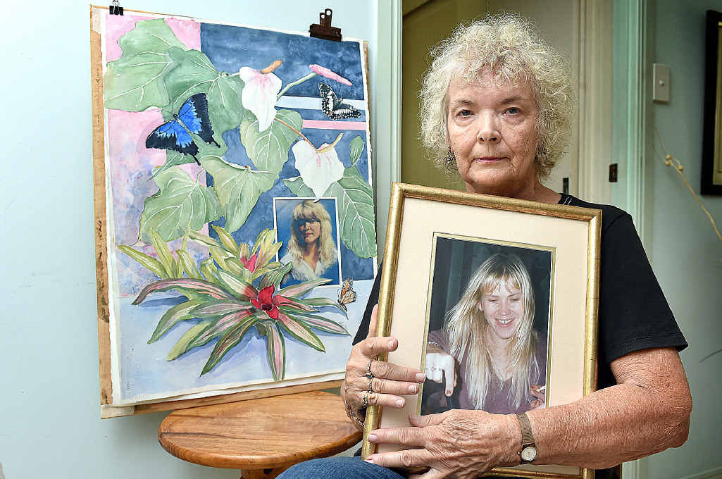 Ligita Sternberg with a portrait and a painting of her daughter Ingrid Lester. Ligita Sternberg with a portrait and a painting of her daughter Ingrid Lester.