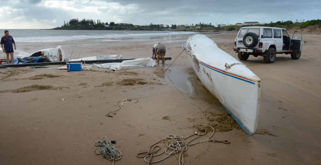 BROKEN SAILS: Abe Sweaney is hoping to see better days after his dad’s catamaran was smashed to pieces and washed up at Tanby Point on Wednesday. BROKEN SAILS: Abe Sweaney is hoping to see better days after his dad’s catamaran was smashed to pieces and washed up at Tanby Point on Wednesday.