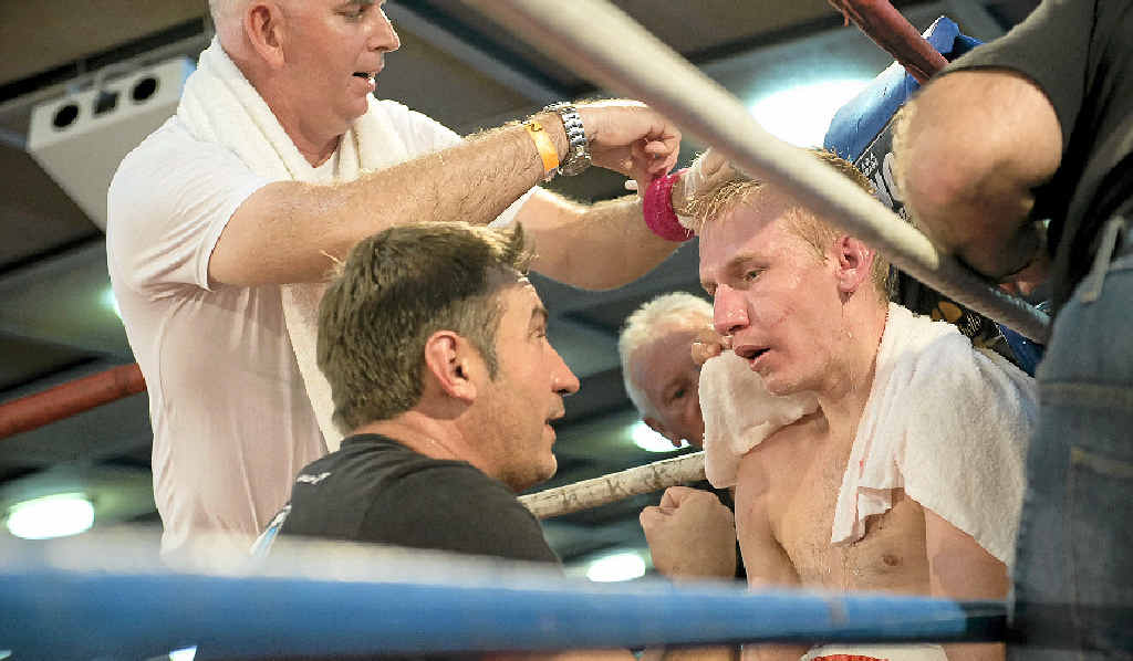 Braydon Smith receives instructions from his father and trainer Brendon Smith during his bout with John Moralde at Rumours International on Saturday night. Braydon Smith receives instructions from his father and trainer Brendon Smith during his bout with John Moralde at Rumours International on Saturday night.