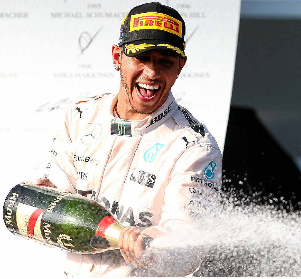 WINNER: Lewis Hamilton celebrates on the podium after winning the Australian Formula One Grand Prix. WINNER: Lewis Hamilton celebrates on the podium after winning the Australian Formula One Grand Prix.