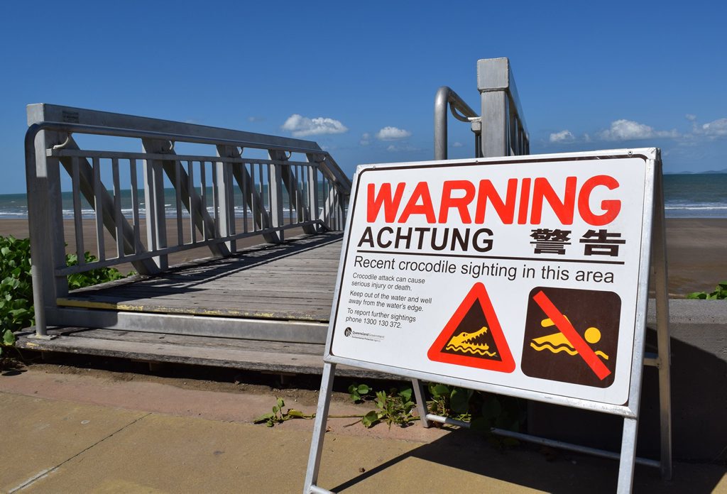A sign has been placed at Yeppoon's main beach to warn swimmers of a croc sighting in the area. Photo Amy Haydock / The Morning Bulletin A sign has been placed at Yeppoon's main beach to warn swimmers of a croc sighting in the area. Photo Amy Haydock / The Morning Bulletin