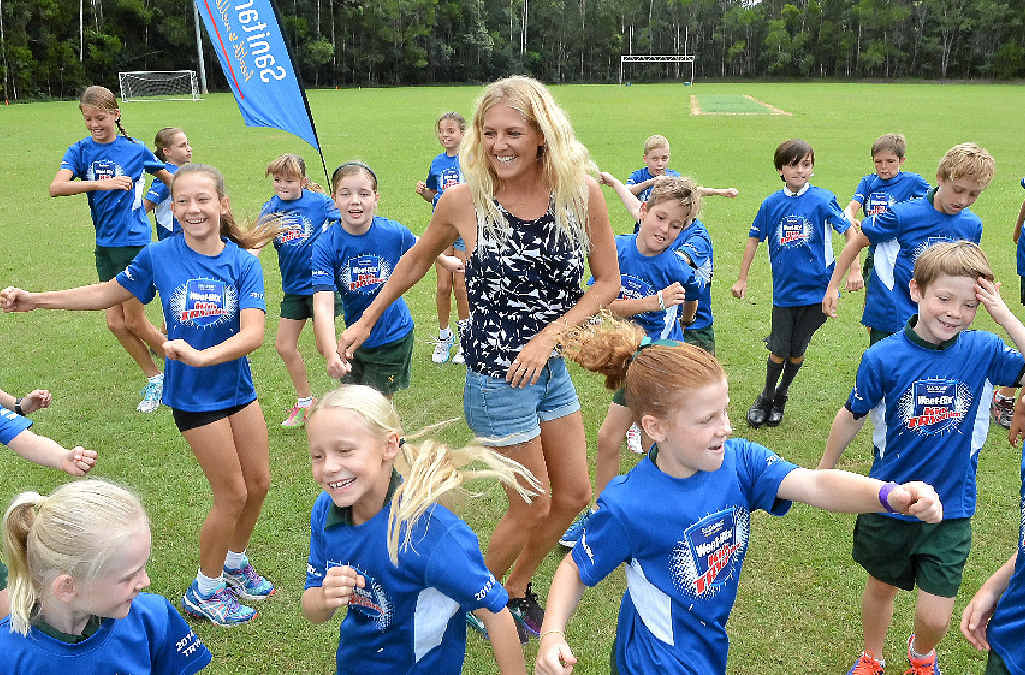 QUEEN OF THE KIDS: Six-time world surfing champion Stephanie Gilmore (above and right) at Sunshine Coast Grammar School yesterday. QUEEN OF THE KIDS: Six-time world surfing champion Stephanie Gilmore (above and right) at Sunshine Coast Grammar School yesterday.