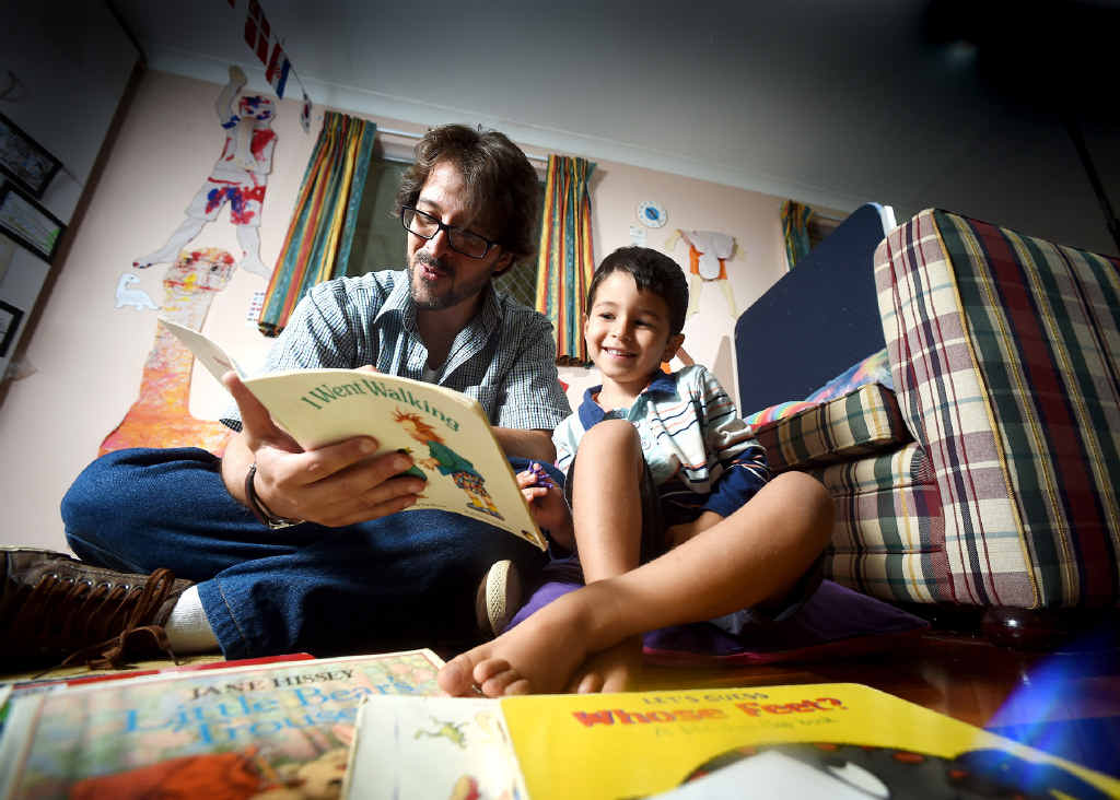 BILINGUAL FAN: Alex Spengler, of Goonellabah, with his three-year-old son Arthur encourages his boy to speak and read Portuguese wherever and whenever possible. BILINGUAL FAN: Alex Spengler, of Goonellabah, with his three-year-old son Arthur encourages his boy to speak and read Portuguese wherever and whenever possible.