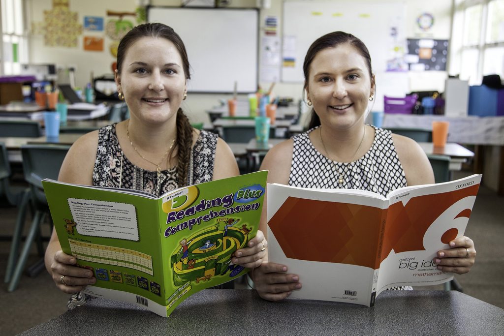 Random questions from their students at Granville State Primary School about whether they live together and share a car often amuse twins Rachel and Carla Frohloff. Random questions from their students at Granville State Primary School about whether they live together and share a car often amuse twins Rachel and Carla Frohloff.