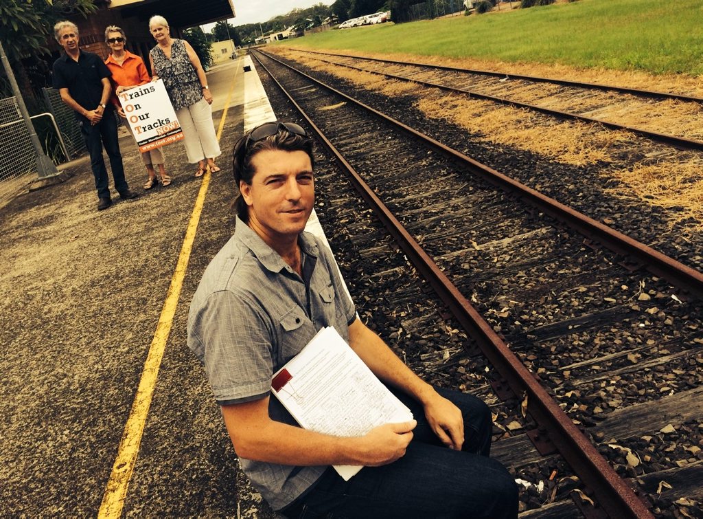 Independent candidate for Ballina, Jeff Johnson, with members of TOOT at the Mullumbimby train station. Photo contributed Independent candidate for Ballina, Jeff Johnson, with members of TOOT at the Mullumbimby train station. Photo contributed
