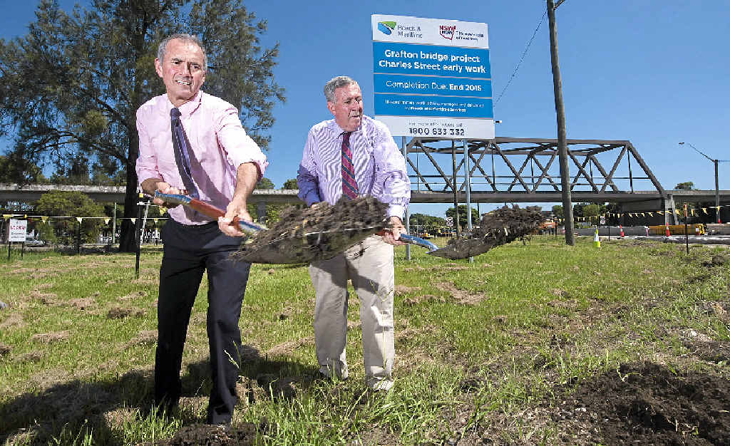 Member for Clarence Chris Gulaptis with minister for roads Duncan Gay turn the first sod on the work for the second Grafton bridge. Photo Adam Hourigan / The Daily Examiner Member for Clarence Chris Gulaptis with minister for roads Duncan Gay turn the first sod on the work for the second Grafton bridge. Photo Adam Hourigan / The Daily Examiner