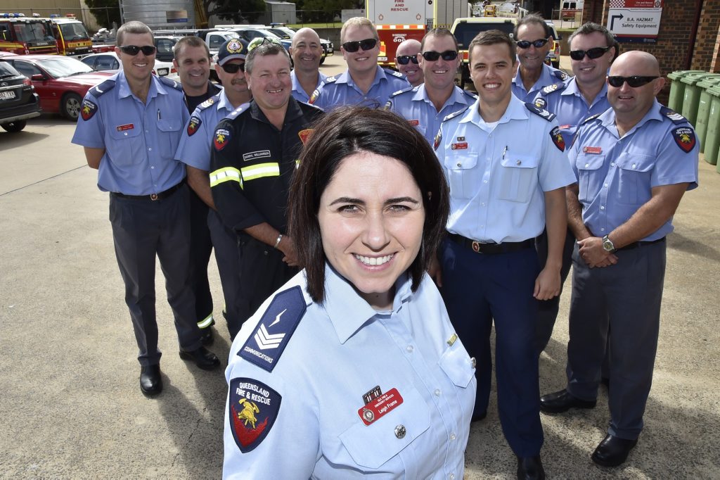 Toowoomba fire communications officer Leigh Frame is congratulated by colleagues and firefighters for receiving a Commissioner's Unit Citation. Toowoomba fire communications officer Leigh Frame is congratulated by colleagues and firefighters for receiving a Commissioner's Unit Citation.