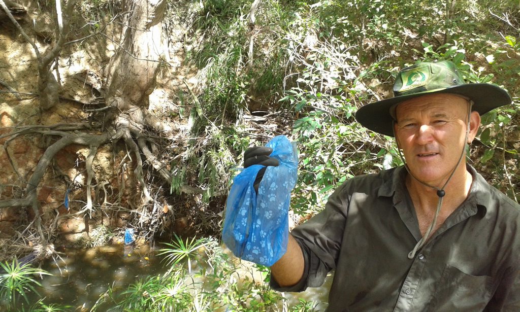 Mike Johnson of Bundaberg Landcare with rubbish found dumped at Saltwater Creek. Photo Contributed Mike Johnson of Bundaberg Landcare with rubbish found dumped at Saltwater Creek. Photo Contributed
