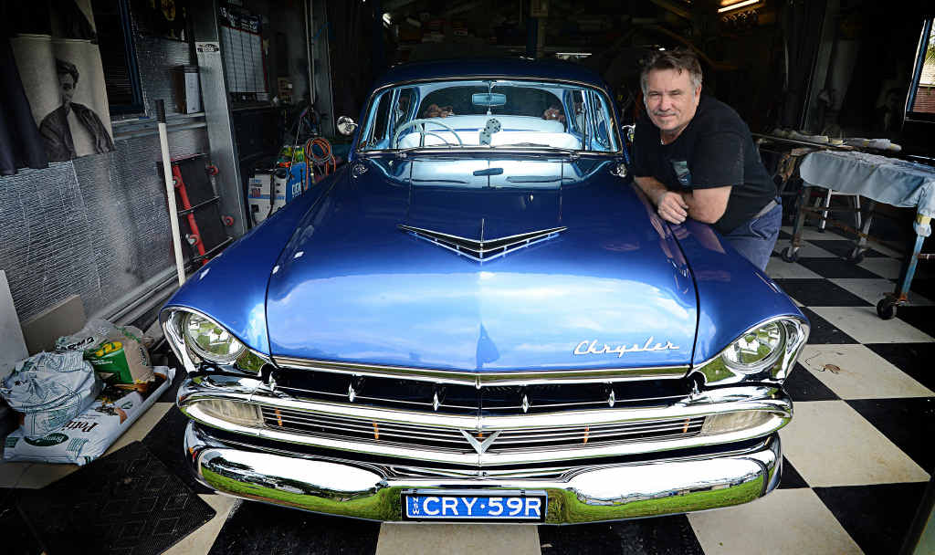 OLD TO NEW: Carl Mills from Carl Mills Stainless Steel Repairer in South Lismore with his restored 1959 Australian Chrysler Royal. OLD TO NEW: Carl Mills from Carl Mills Stainless Steel Repairer in South Lismore with his restored 1959 Australian Chrysler Royal.