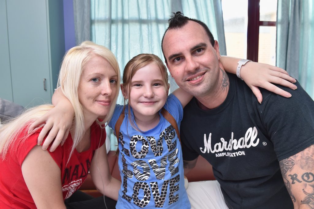 Jess Irving with her parents Mat and Trina. Jess Irving with her parents Mat and Trina.