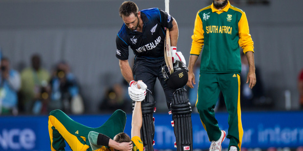 Grant Elliott helps up a upset Dale Steyn of South Africa after the end of the ICC Cricket World Cup semi-final match between New Zealand and South Africa at Eden Park, Auckland. 24 March 2015 Grant Elliott helps up a upset Dale Steyn of South Africa after the end of the ICC Cricket World Cup semi-final match between New Zealand and South Africa at Eden Park, Auckland. 24 March 2015