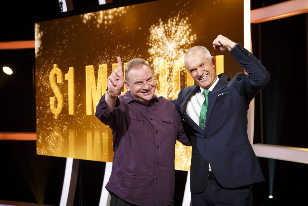 Million Dollar Minute winner Andrew Skarbek pictured with host Simon Reeve. Million Dollar Minute winner Andrew Skarbek pictured with host Simon Reeve.
