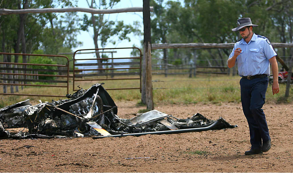 CRASH SCENE: Senior Constable John Shilton assesses the site where a helicopter crashed at Tartrus Station in 2007. CRASH SCENE: Senior Constable John Shilton assesses the site where a helicopter crashed at Tartrus Station in 2007.