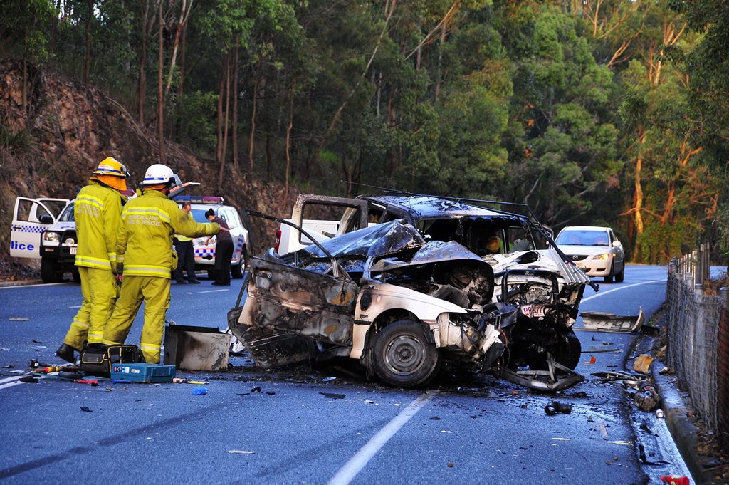 The scene of the fatal collision in July 2010 at Cooroy-Noosa Rd. Two men have been honoured with bravery awards for pulling people from this wreck. The scene of the fatal collision in July 2010 at Cooroy-Noosa Rd. Two men have been honoured with bravery awards for pulling people from this wreck.