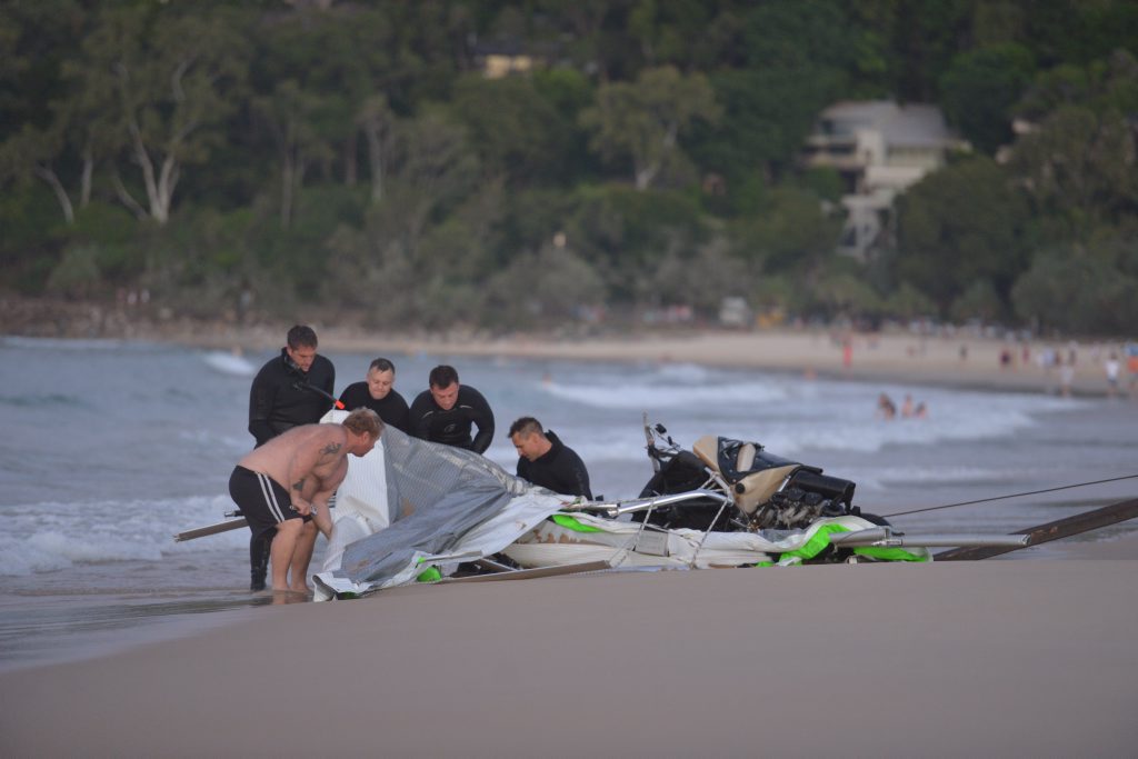 Police retrieve the ultrslight that crashed off Noosa Main beach. Photo: John McCutcheon / Sunshine Coast Daily Police retrieve the ultrslight that crashed off Noosa Main beach. Photo: John McCutcheon / Sunshine Coast Daily