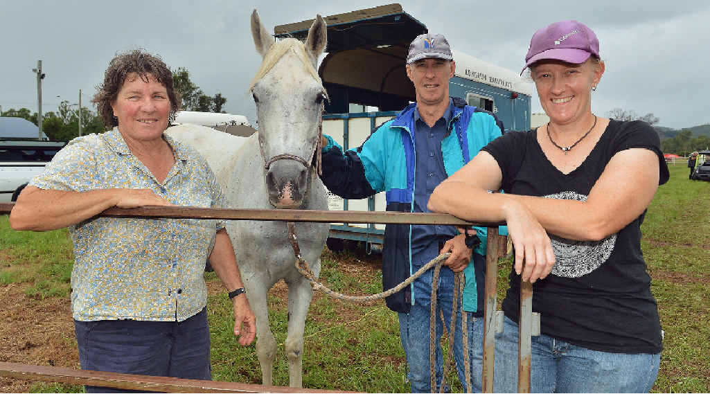 FROM LEFT: Jackie Swan from Widgee with her mount, 10-year-old mare, Shantele. Jackie will do a 320km marathon over the four days. With her is Wes Russell from Horse and Rider Therapy at Marcus Beach, and Kellie Hart from Widgee. FROM LEFT: Jackie Swan from Widgee with her mount, 10-year-old mare, Shantele. Jackie will do a 320km marathon over the four days. With her is Wes Russell from Horse and Rider Therapy at Marcus Beach, and Kellie Hart from Widgee.
