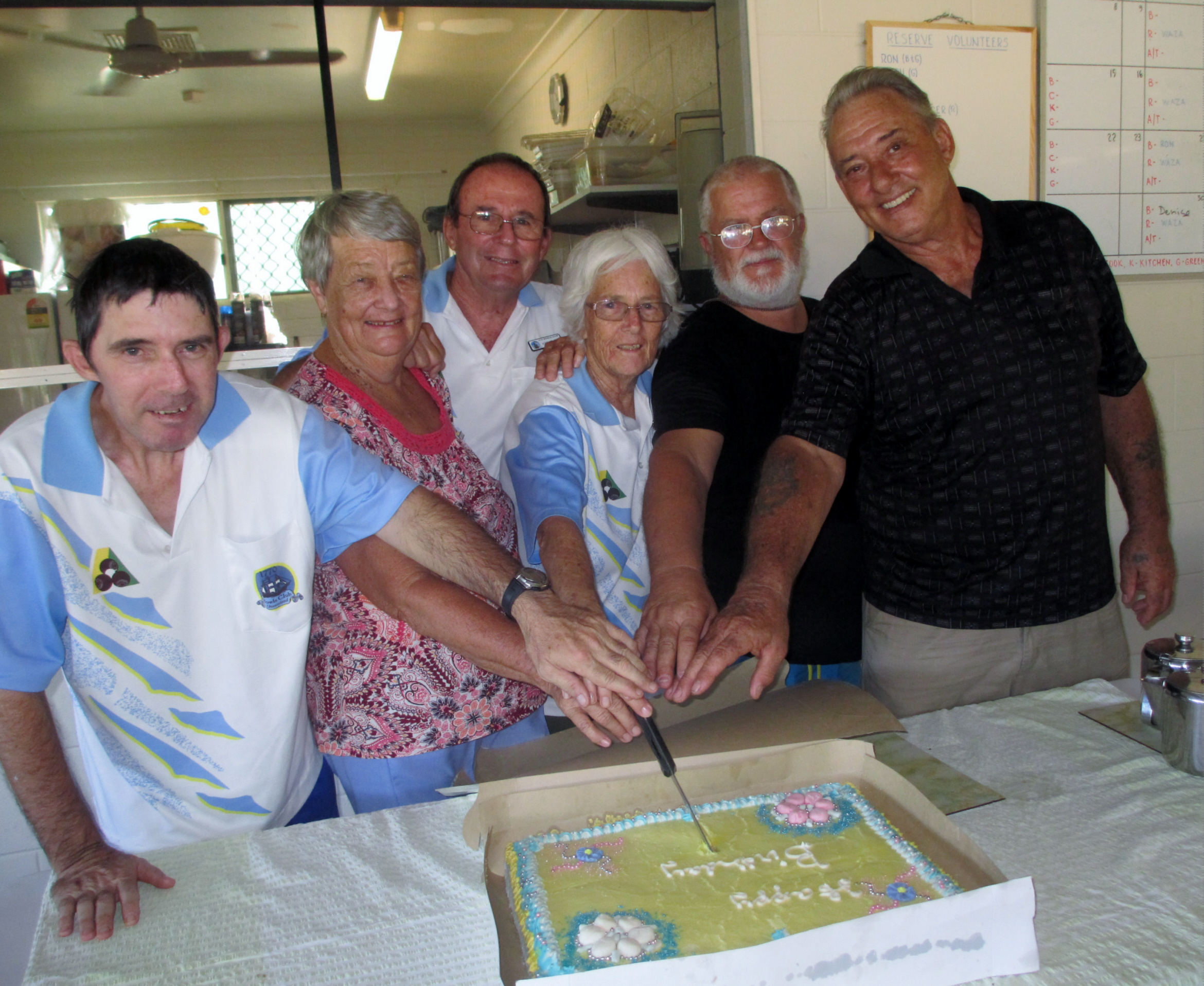 Cutting the birthday cake at Seventeen Seventy Bowls Club are the longest serving members still playing, Warren Fraser, Leveen Campbell, and John and Stephanie Fraser, with newest members Ken Diplock and Eric Watson.