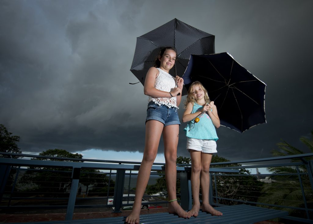 Jemilla, 11, and sister Lilly Halliday, 7 had just arrived in Gladstone from Brisbane on their way to Heron Island for the Easter Holidays, and got to watch an afternoon storm roll in. Jemilla, 11, and sister Lilly Halliday, 7 had just arrived in Gladstone from Brisbane on their way to Heron Island for the Easter Holidays, and got to watch an afternoon storm roll in.