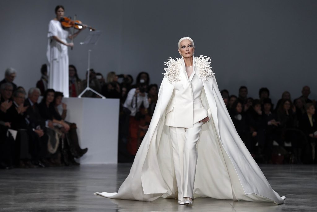 US model and actress Carmen Dell'Orefice presents a creation by French designer Stephane Rolland during the Haute Couture Spring-Summer 2013 collection shows in Paris. US model and actress Carmen Dell'Orefice presents a creation by French designer Stephane Rolland during the Haute Couture Spring-Summer 2013 collection shows in Paris.