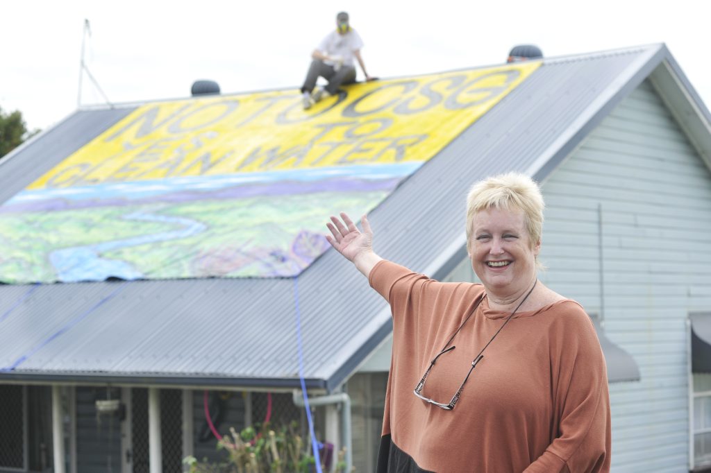 Jenny Leunig, of Lismore, shows off her giant protest sign against CSG painted by Julla Livingston. Jenny Leunig, of Lismore, shows off her giant protest sign against CSG painted by Julla Livingston.