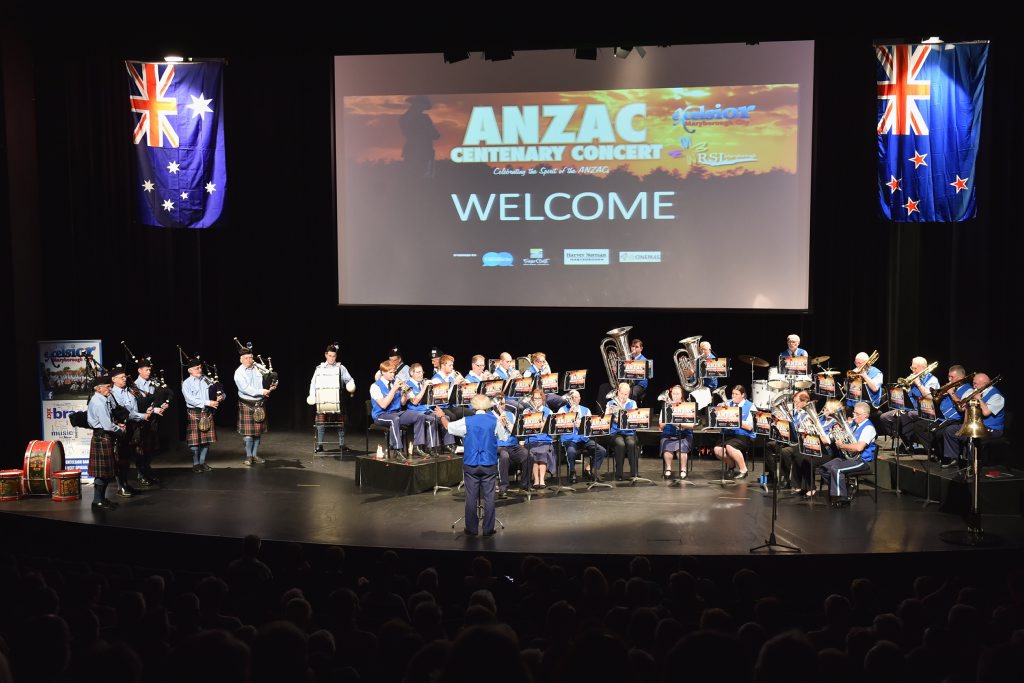 The Maryborough RSL Pipe Band and the Maryborough Excelsior Band share the stage for the opening song at the Anzac Centenary Concert at the Brolga.