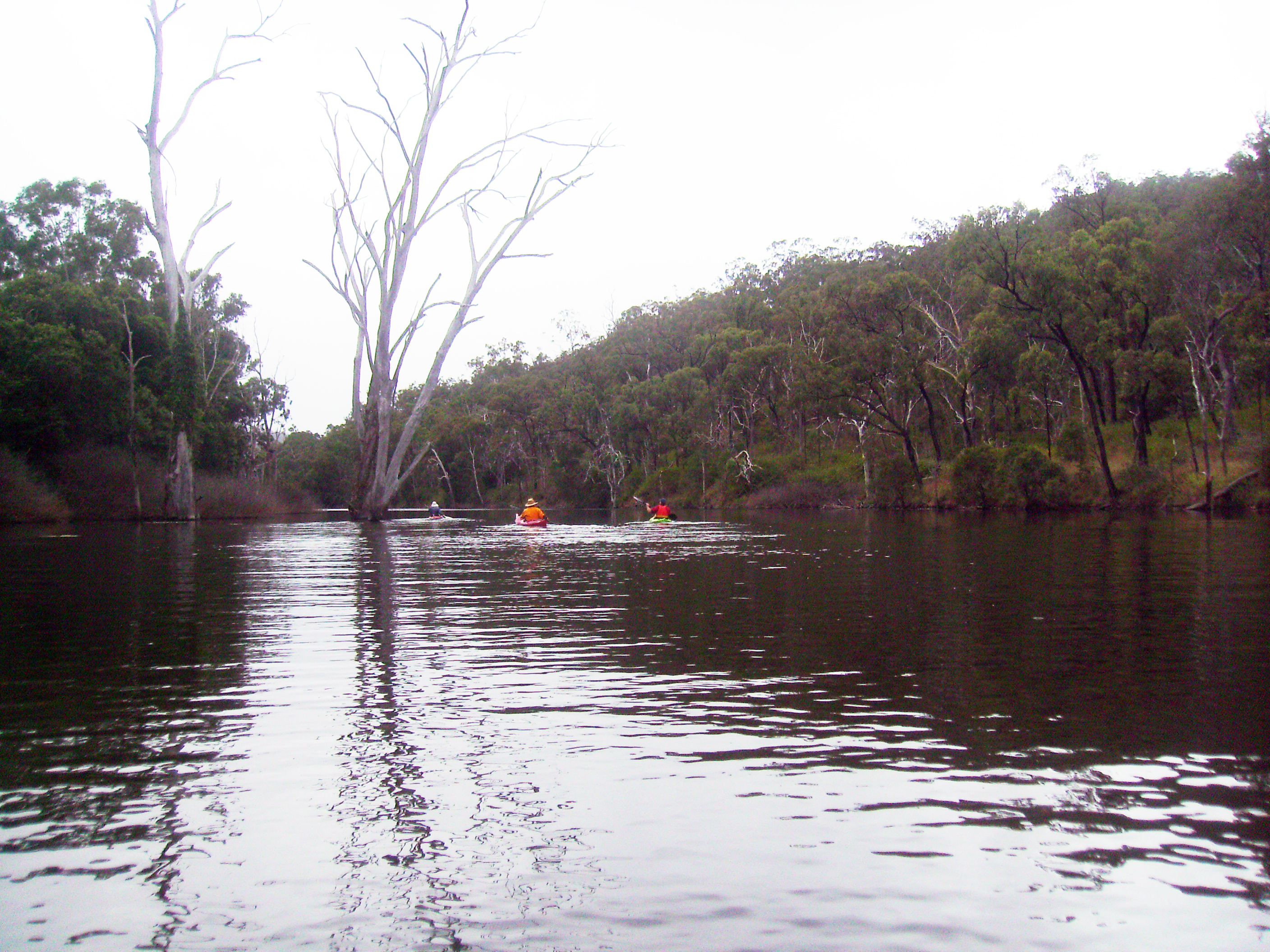Kayaks on Eungella Dam after an overnight camp Kayaks on Eungella Dam after an overnight camp
