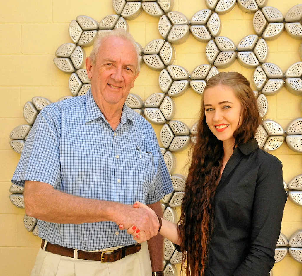 FINE WORK: Gladstone Regional Art Gallery and Museum Society president Bruce Hunt congratulates Cassandra Paddick on her award win. FINE WORK: Gladstone Regional Art Gallery and Museum Society president Bruce Hunt congratulates Cassandra Paddick on her award win.