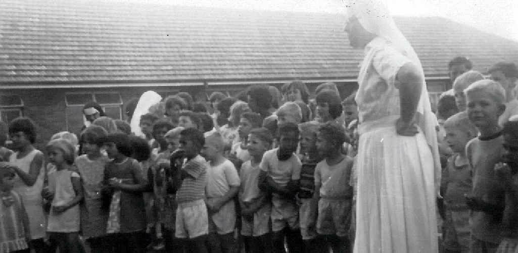 TOUGH TIMES: A nun at Neerkol Orphanage with children in the care of the Sisters of Mercy. TOUGH TIMES: A nun at Neerkol Orphanage with children in the care of the Sisters of Mercy.