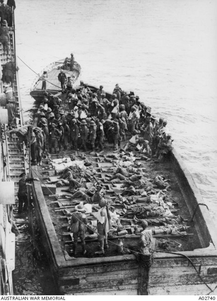 A barge transports wounded soldiers from Anzac Cove to the hospital ship Gascon. Courtesy of Australian War Memorial A02740 A barge transports wounded soldiers from Anzac Cove to the hospital ship Gascon. Courtesy of Australian War Memorial A02740