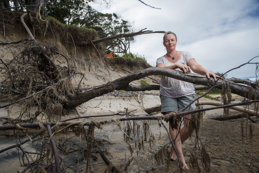 WASHED AWAY: Wild Cattle Creek has been eroded, halting the access to the beach below. Local resident Kahn Bailey is ashamed at the slow progress council is taking to address the problem. WASHED AWAY: Wild Cattle Creek has been eroded, halting the access to the beach below. Local resident Kahn Bailey is ashamed at the slow progress council is taking to address the problem.