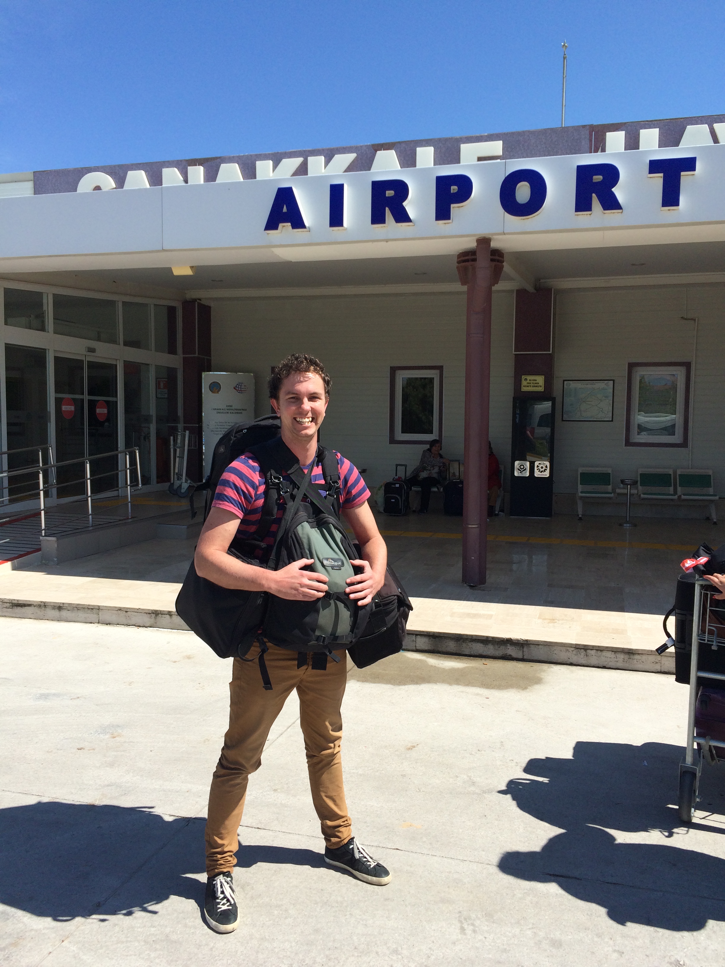 Reporter Stuart Cumming celebrates his luggage arriving with him at Canakkale after four consecutive flights on four different planes. Reporter Stuart Cumming celebrates his luggage arriving with him at Canakkale after four consecutive flights on four different planes.