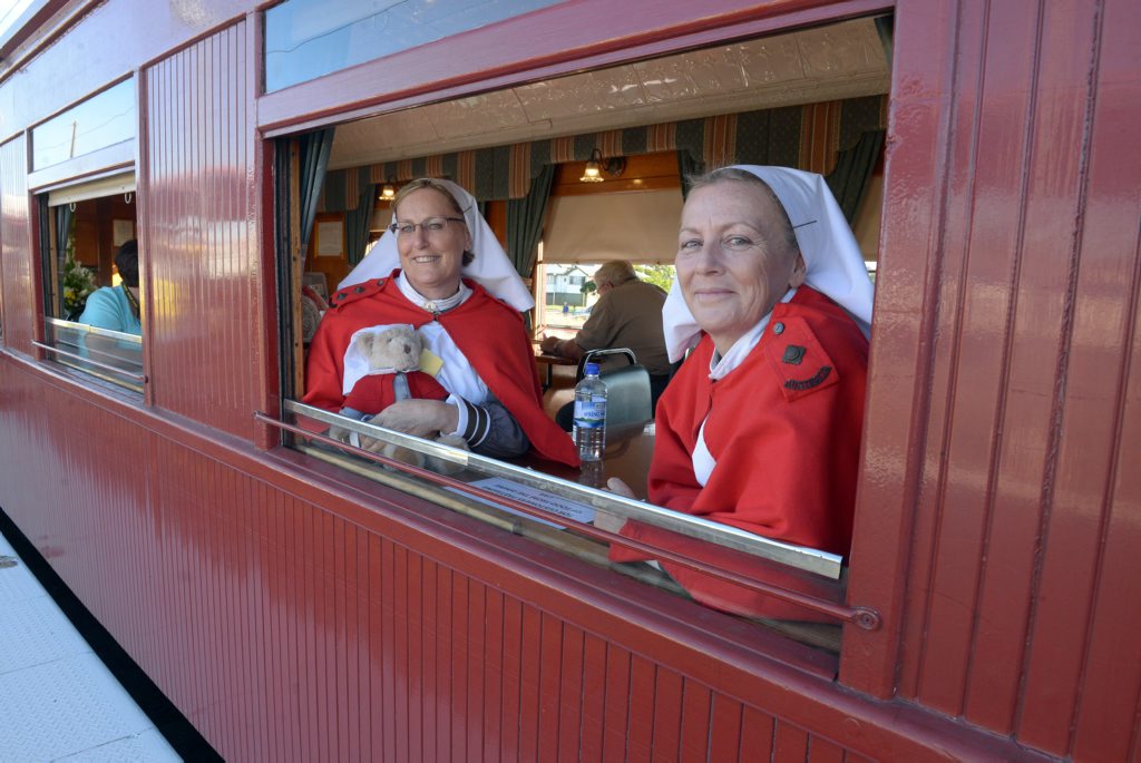 Image for sale: MEMORIAL RUN: Train enthusiasts gather to watch the troop train re-enactment rolled through Bundaberg on Thursday, 23 April 2015. Photo: Max Fleet / NewsMail