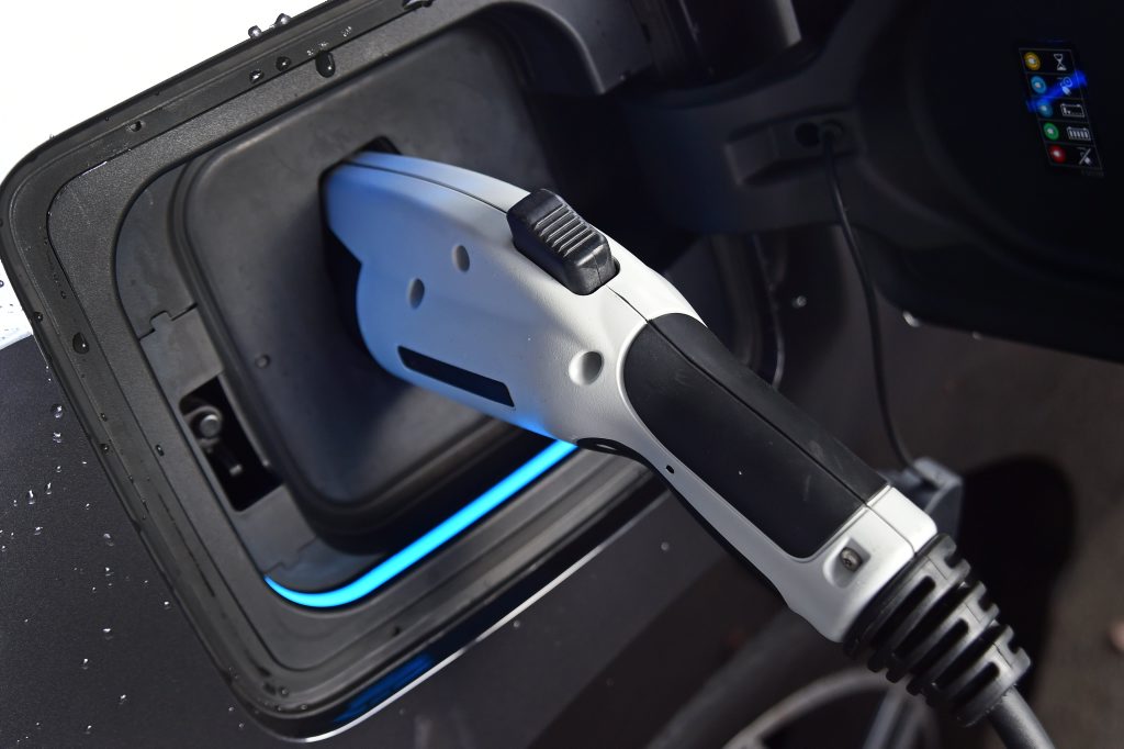 ON CHARGE: Plugging in your BMW i3. ON CHARGE: Plugging in your BMW i3.