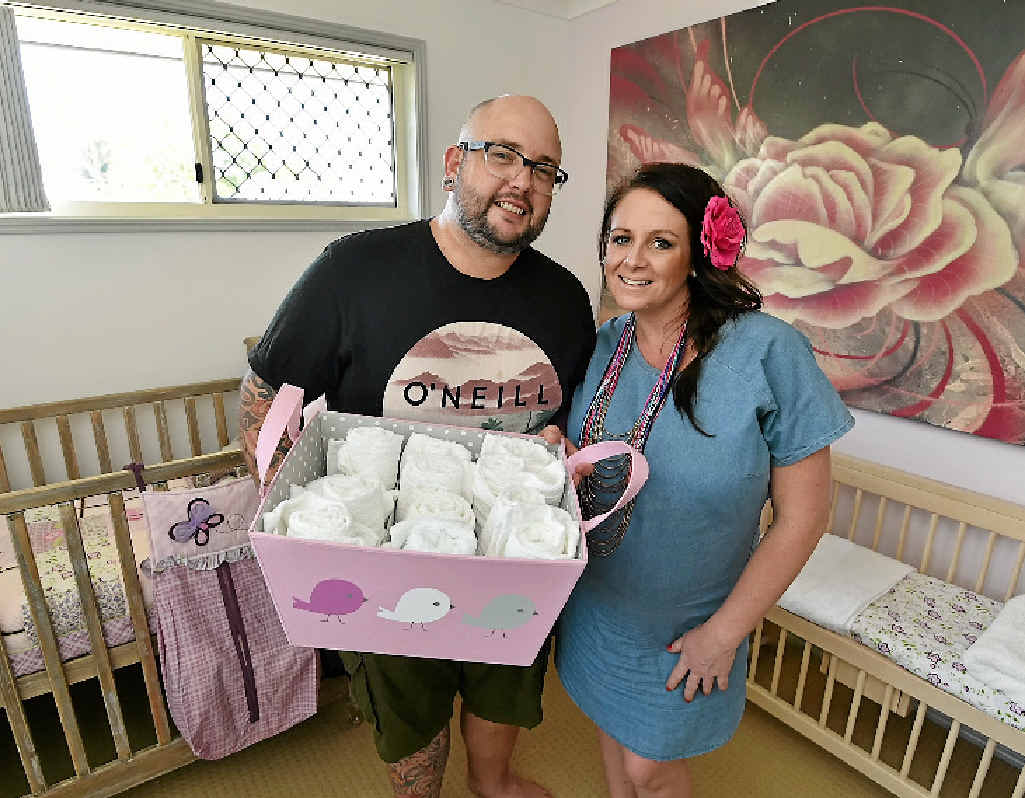 READY AND WAITING: Dan and Steph Mulheron in their nursery before the arrival of their little girl on April 23. READY AND WAITING: Dan and Steph Mulheron in their nursery before the arrival of their little girl on April 23.
