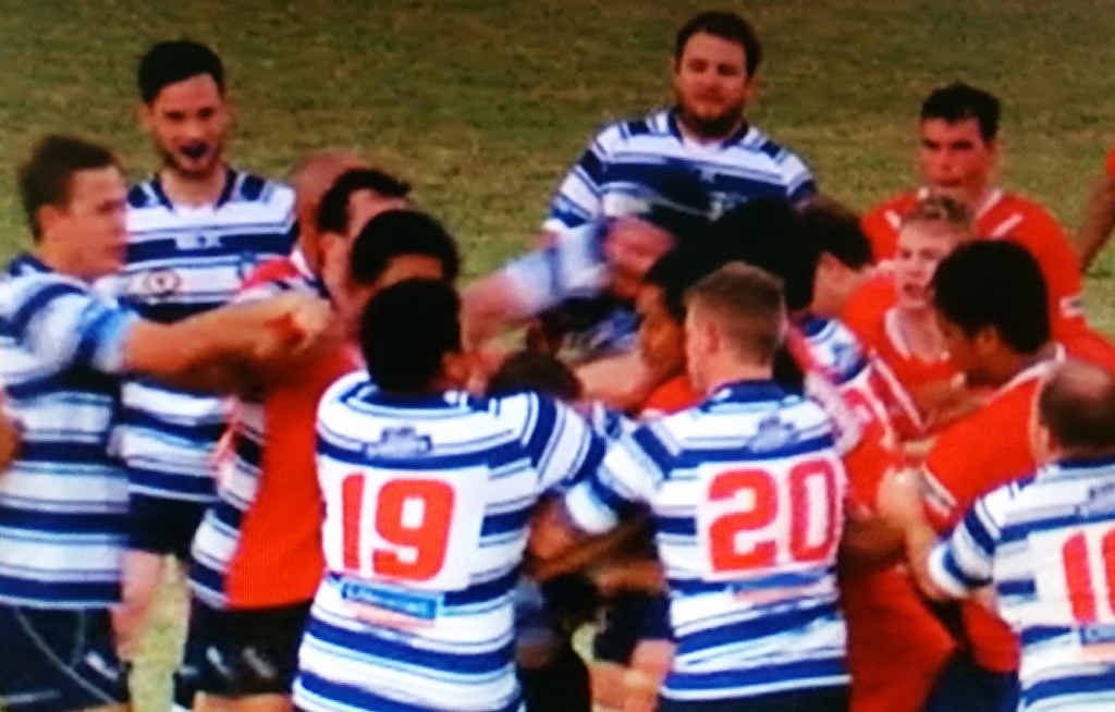 CAUGHT ON CAMERA: Players from Colts and Brothers A-grade teams throw punches as a big brawl unfolds after their game on Anzac Day.
PHOTO COURTESY: CHANNEL 7 ROCKHAMPTON CAUGHT ON CAMERA: Players from Colts and Brothers A-grade teams throw punches as a big brawl unfolds after their game on Anzac Day.
PHOTO COURTESY: CHANNEL 7 ROCKHAMPTON
