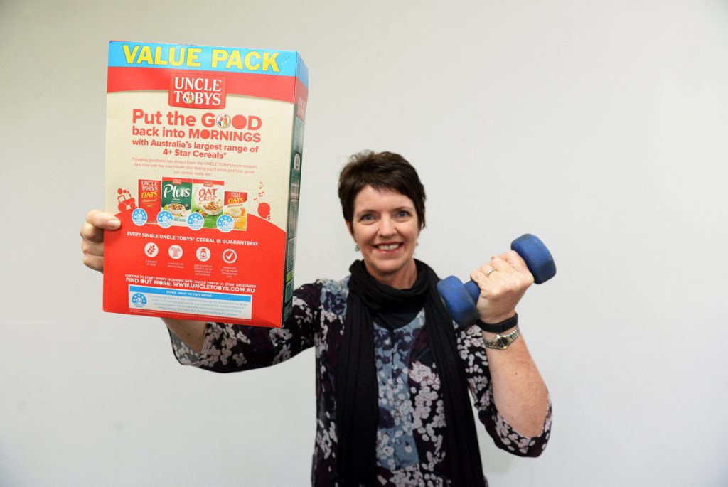 BALANCED DIET: Dietitian Fiona Graham with a box of cereal illustrating the new health star rating. The new health star rating scheme converts complex nutrition panels to simple, at-a-glance labels. The more stars you see, the healthier the food. Photo: Mike Knott / NewsMail BALANCED DIET: Dietitian Fiona Graham with a box of cereal illustrating the new health star rating. The new health star rating scheme converts complex nutrition panels to simple, at-a-glance labels. The more stars you see, the healthier the food. Photo: Mike Knott / NewsMail