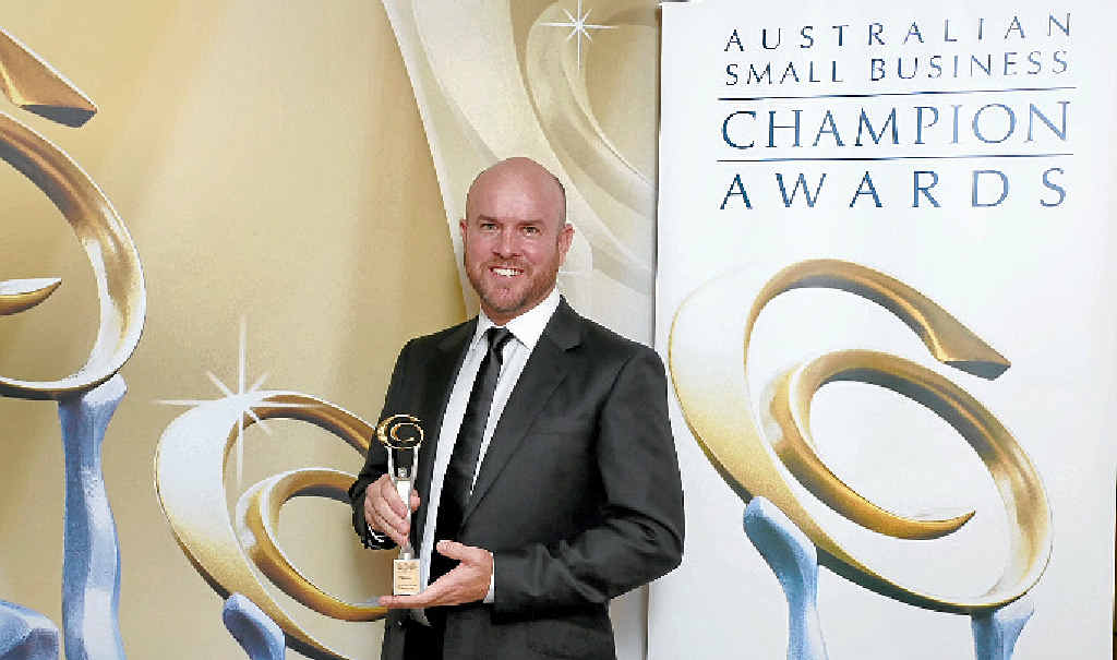 THRILLED: John Pearson accepted the 2015 Australian Small Business Champion Award for the indigenous business category on behalf of his firm. THRILLED: John Pearson accepted the 2015 Australian Small Business Champion Award for the indigenous business category on behalf of his firm.