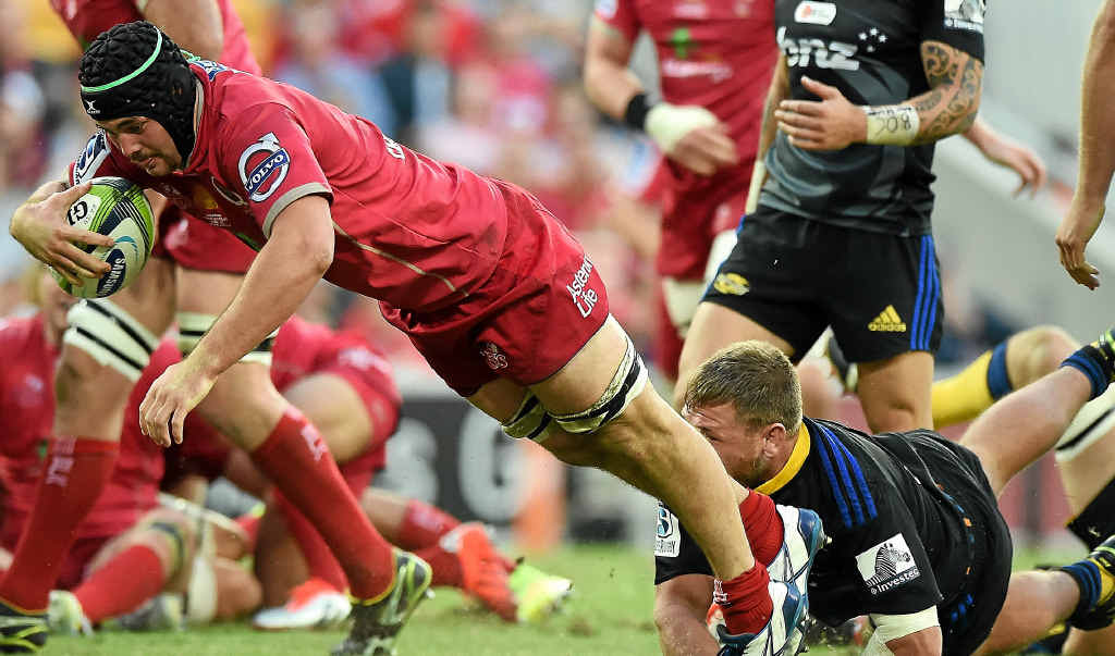 FALSE DAWN: Reds player Liam Gill scores a try against the Hurricanes. FALSE DAWN: Reds player Liam Gill scores a try against the Hurricanes.