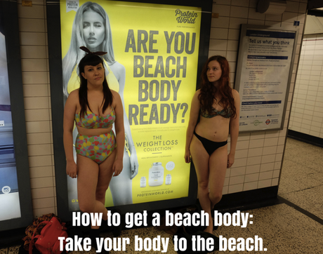 Bloggers Fiona Longmuir and Tara Costello posed in their bikinis in front of the sign Bloggers Fiona Longmuir and Tara Costello posed in their bikinis in front of the sign