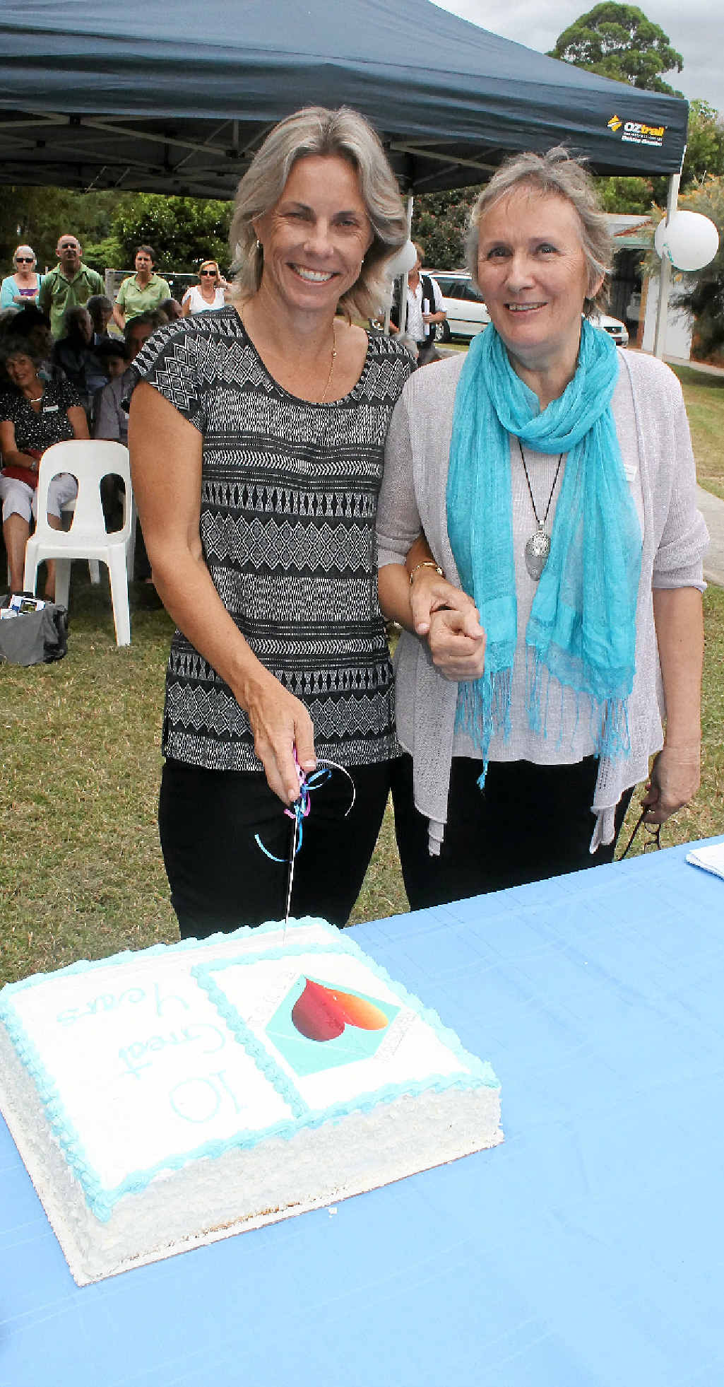 A DECADE ON: Founder and executive director of Heartfelt House Vicki Dobrunz and program co-ordinator Heidi Tornow cut the cake to mark the Wollongbar support service’s 10th anniversary. A DECADE ON: Founder and executive director of Heartfelt House Vicki Dobrunz and program co-ordinator Heidi Tornow cut the cake to mark the Wollongbar support service’s 10th anniversary.