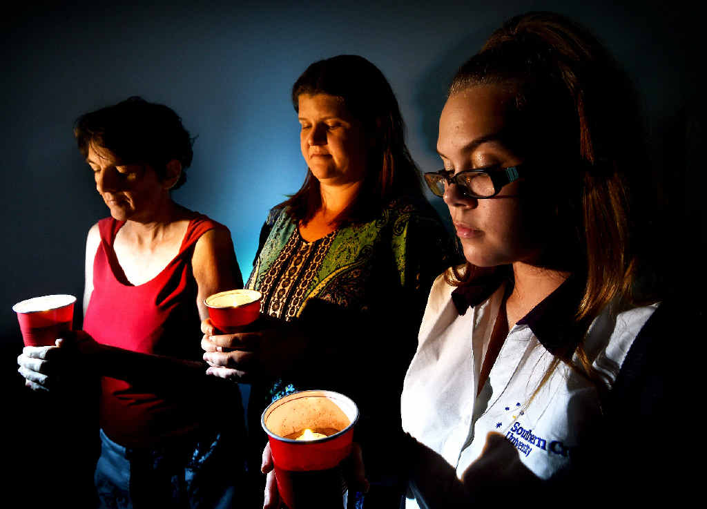 REMEMBER: Lismore Women’s Health and Resource Centre manager Sandra Handley, Intake Officer Tracey Devine, and student nurse Lauren Ostrowski light candles in remembrance of women who have been killed in domestic violence. REMEMBER: Lismore Women’s Health and Resource Centre manager Sandra Handley, Intake Officer Tracey Devine, and student nurse Lauren Ostrowski light candles in remembrance of women who have been killed in domestic violence.