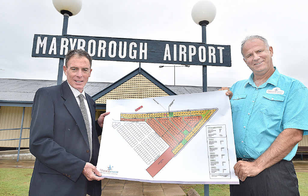 BIG PLANS: Fraser Coast Residential Airpark Pty Ltd director Brad Tallis (right) with Mayor Gerard O’Connell and plans for the proposed development. BIG PLANS: Fraser Coast Residential Airpark Pty Ltd director Brad Tallis (right) with Mayor Gerard O’Connell and plans for the proposed development.