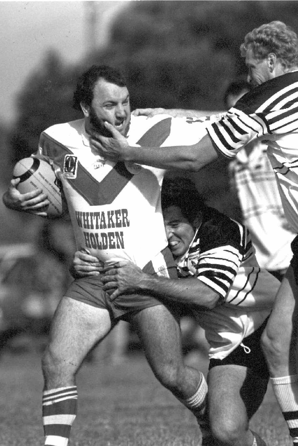 GOING DOWN: Raiders player Robert Bollinger attempts to escape a Brothers tackle in March 1994.PHOTO: FILE GOING DOWN: Raiders player Robert Bollinger attempts to escape a Brothers tackle in March 1994.PHOTO: FILE