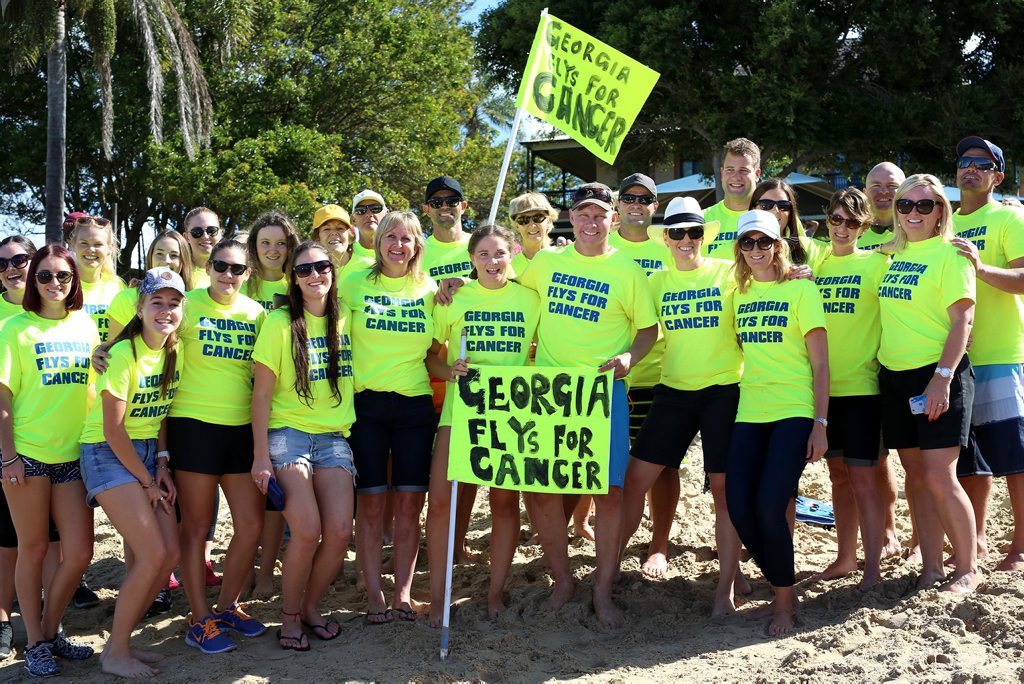 Georgia Quin with her supporters, Georgia swam at Shaws Bay to raise money for Cancer. Photo: Nolan Verheij-Full / Northern Star Georgia Quin with her supporters, Georgia swam at Shaws Bay to raise money for Cancer. Photo: Nolan Verheij-Full / Northern Star
