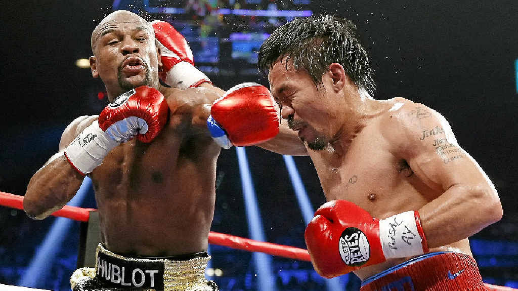 FISTS FLY: Floyd Mayweather Jr faces up to Manny Pacquiao in Las Vegas.
