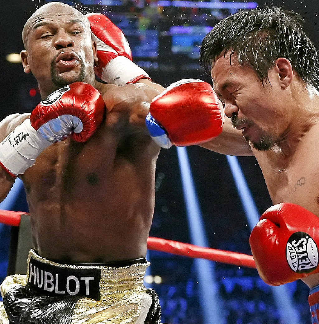 Floyd Mayweather Jr, left, faces off with Manny Pacquiao, from the Philippines in Las Vegas. Floyd Mayweather Jr, left, faces off with Manny Pacquiao, from the Philippines in Las Vegas.