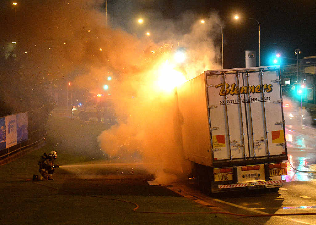 MYSTERY BLAZE: Gympie Fire and Emergency Service officers battle to extinguish a truck fire on the Bruce Hwy on Friday night. MYSTERY BLAZE: Gympie Fire and Emergency Service officers battle to extinguish a truck fire on the Bruce Hwy on Friday night.