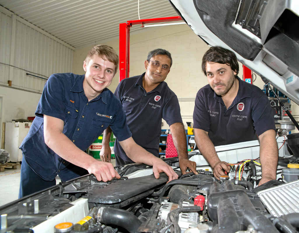 SOUTH COFFS MOTORS: Apprentice Jack Jennings, with owner Ram Gounder and automotive technician Joel Flanders. SOUTH COFFS MOTORS: Apprentice Jack Jennings, with owner Ram Gounder and automotive technician Joel Flanders.